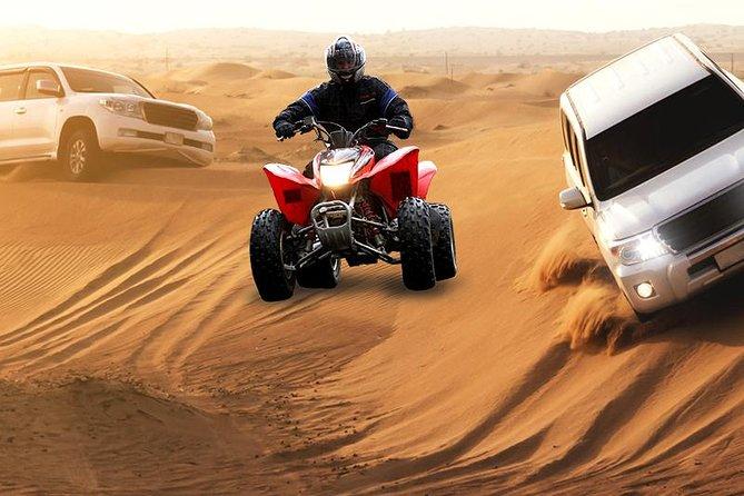 Person riding ATV in desert